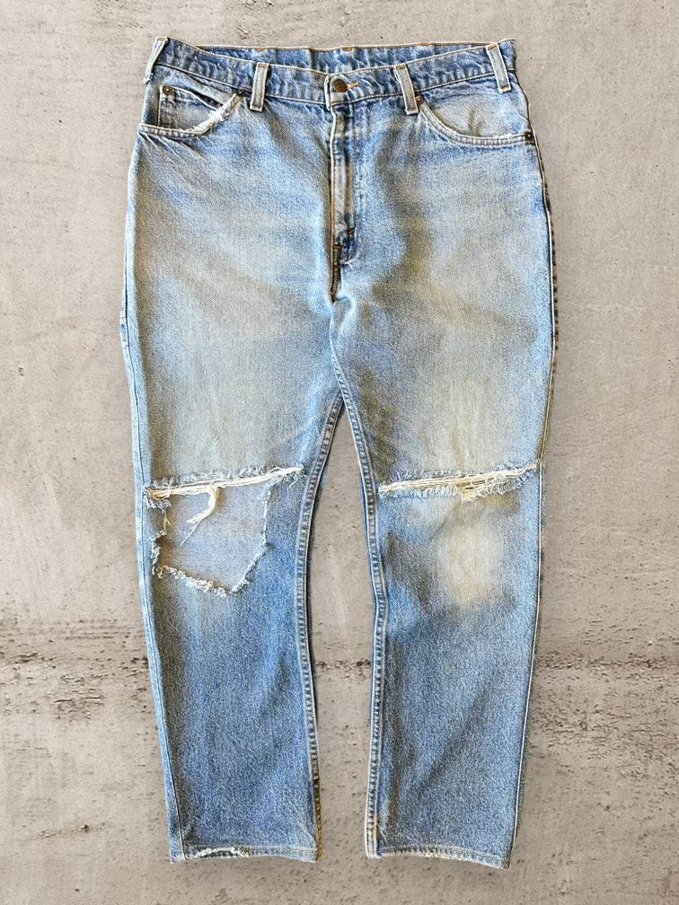 90s Levi’s Leather Tab Light Wash Distressed Denim Jeans - 34x28