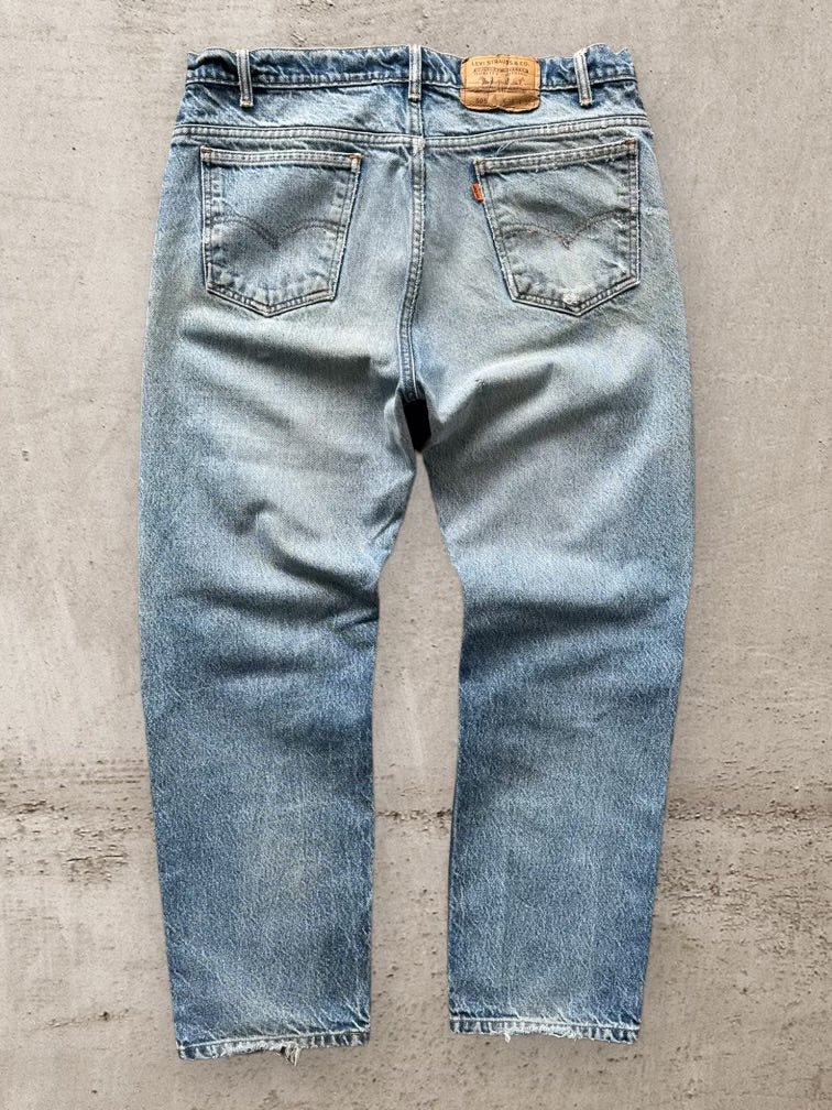 90s Levi’s 505 Distressed Orange Tab Denim Jeans -