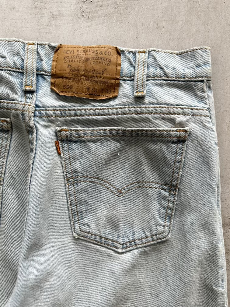 90s Levi’s 550 Distressed Orange Tab Jeans - 32