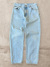 Load image into Gallery viewer, 90s Calvin Klein Light Wash Jeans - 33x30
